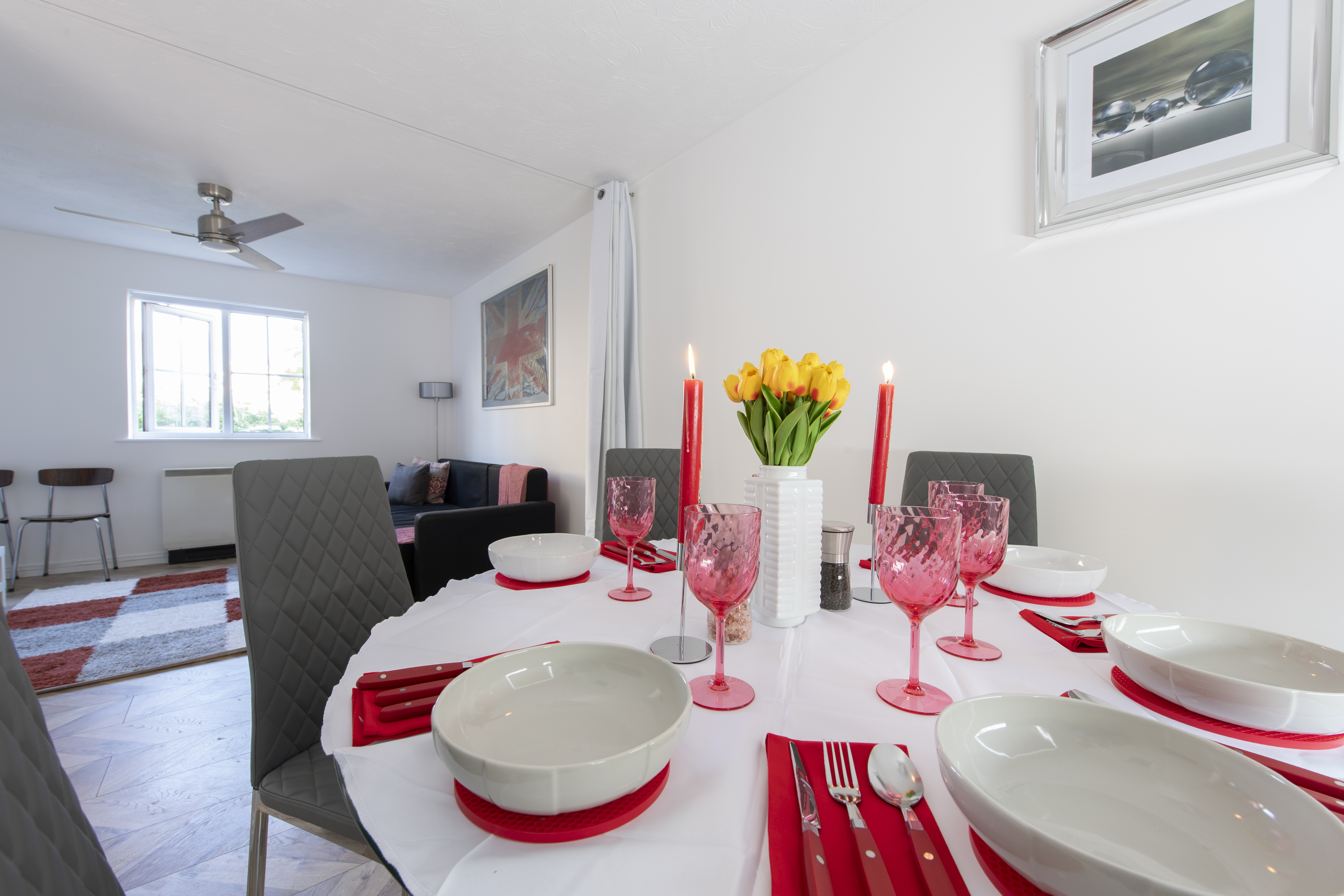 Property two — dining table with tulips and place settings